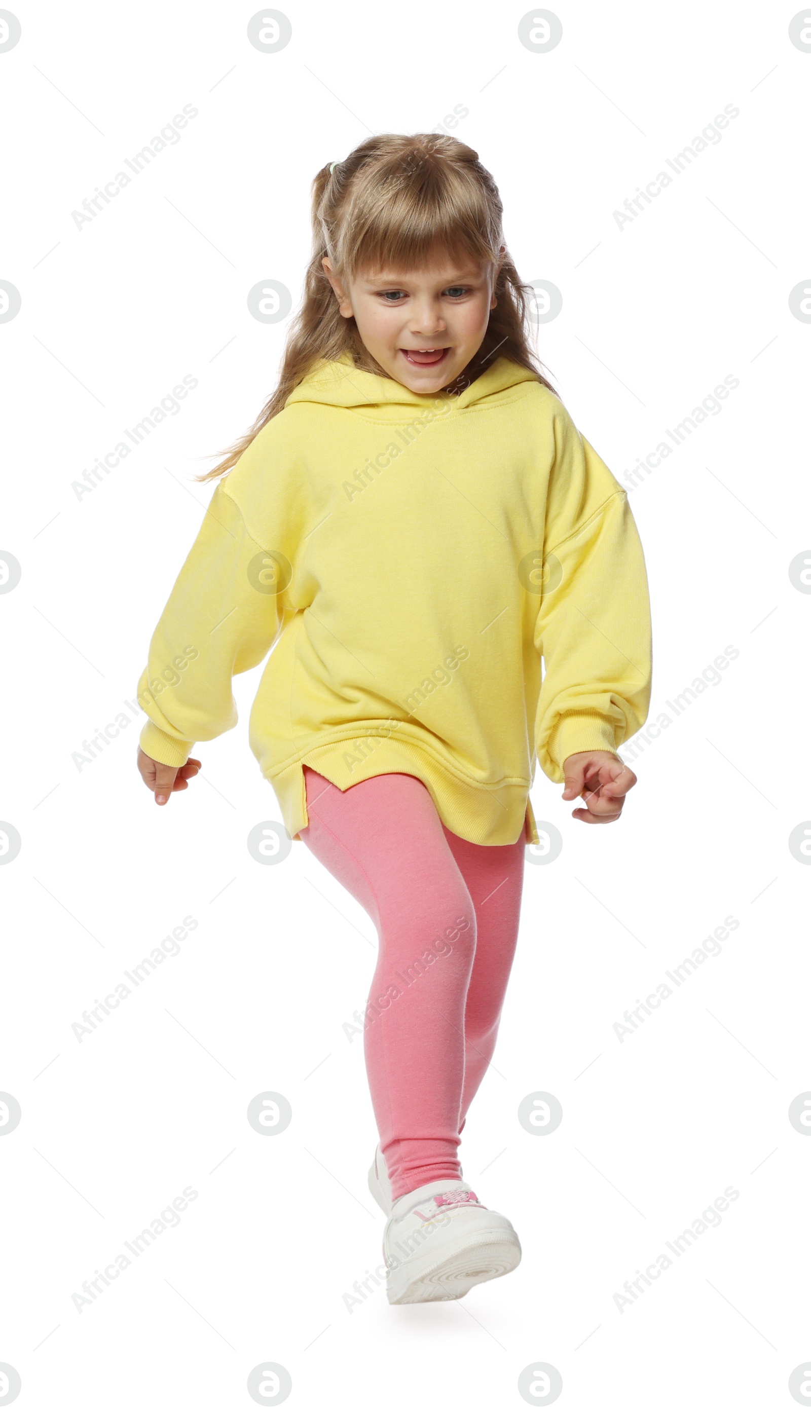 Photo of Cute little girl dancing on white background