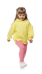 Photo of Cute little girl dancing on white background