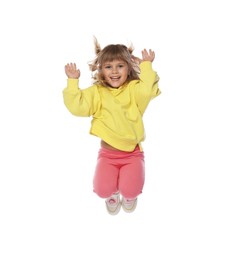 Photo of Happy little girl dancing on white background