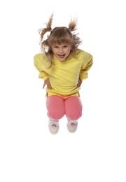 Photo of Happy little girl dancing on white background