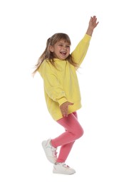 Photo of Happy little girl dancing on white background