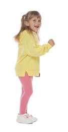 Photo of Happy little girl dancing on white background
