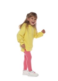 Photo of Happy little girl dancing on white background