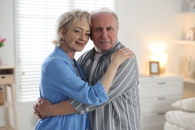 Photo of Portrait of lovely senior couple at home