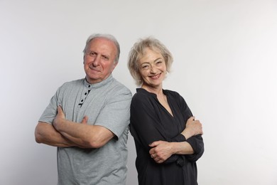 Photo of Portrait of lovely senior couple on white background