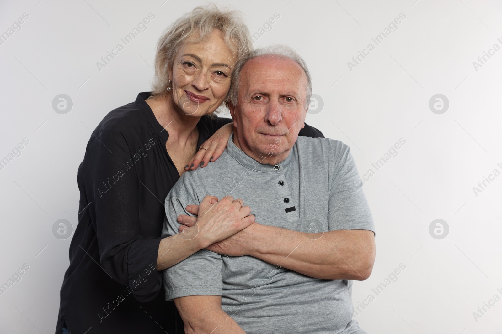 Photo of Portrait of lovely senior couple on white background