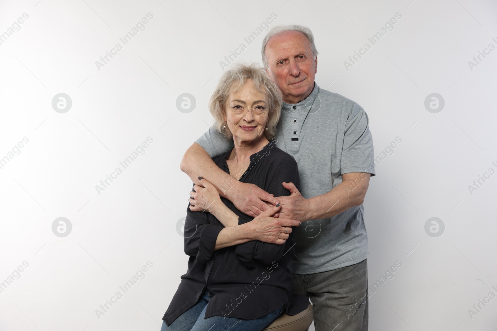 Photo of Portrait of lovely senior couple on white background