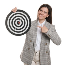 Photo of Targeting. Smiling businesswoman pointing at dart board on white background