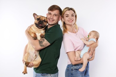 Photo of Happy family with little baby and cute dog on white background