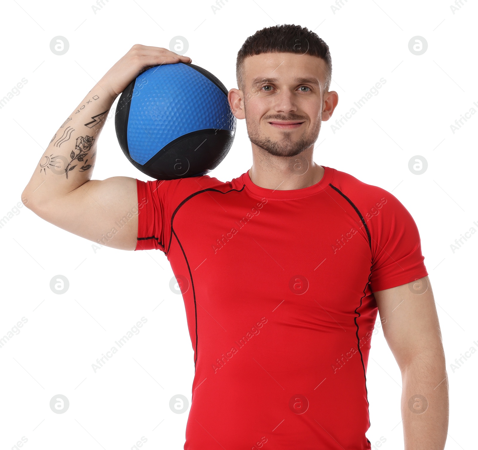 Man with medicine ball on white background Photo of Man with medicine ball on white background