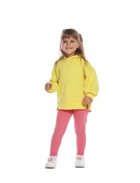 Photo of Happy little girl dancing on white background