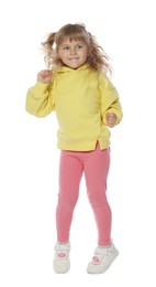 Photo of Happy little girl dancing on white background