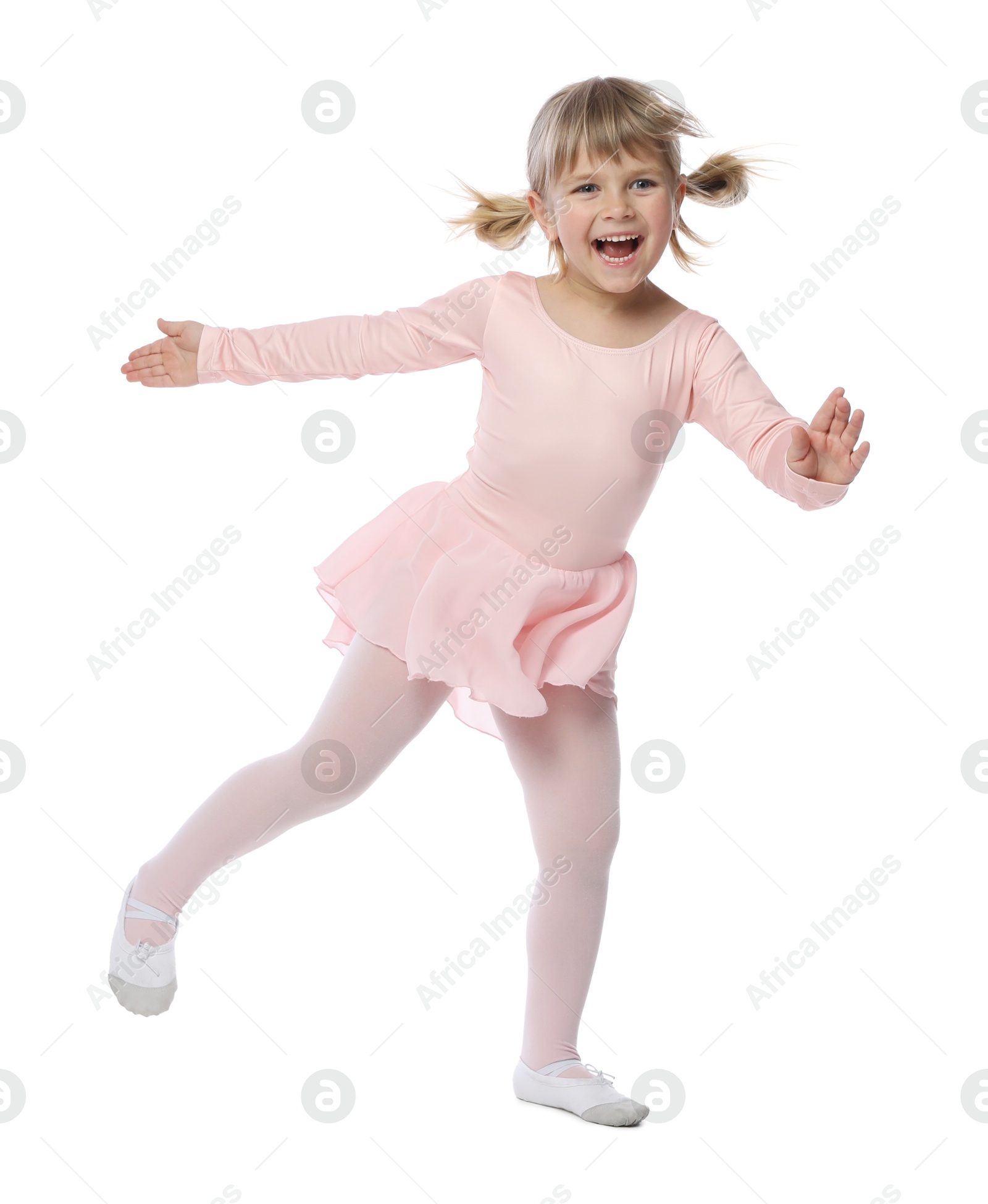 Cute little girl dancing on white background Photo of Cute little girl dancing on white background