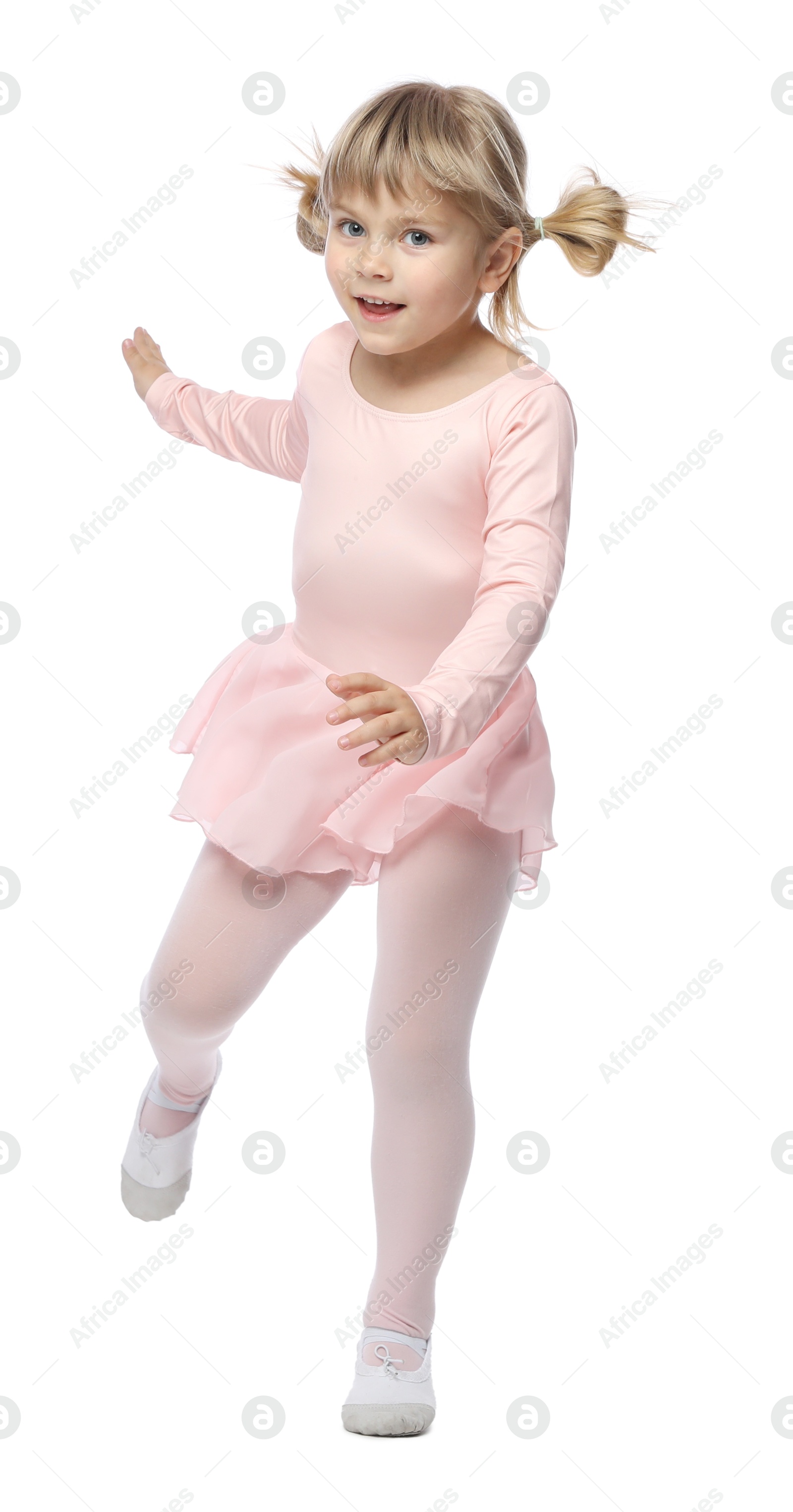 Cute little girl dancing on white background Photo of Cute little girl dancing on white background