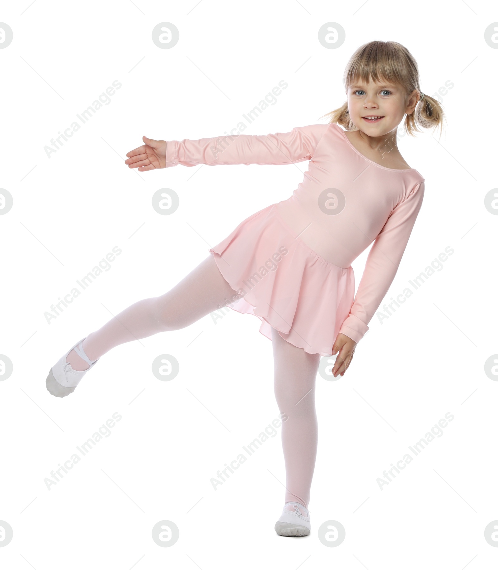 Cute little girl dancing on white background Photo of Cute little girl dancing on white background