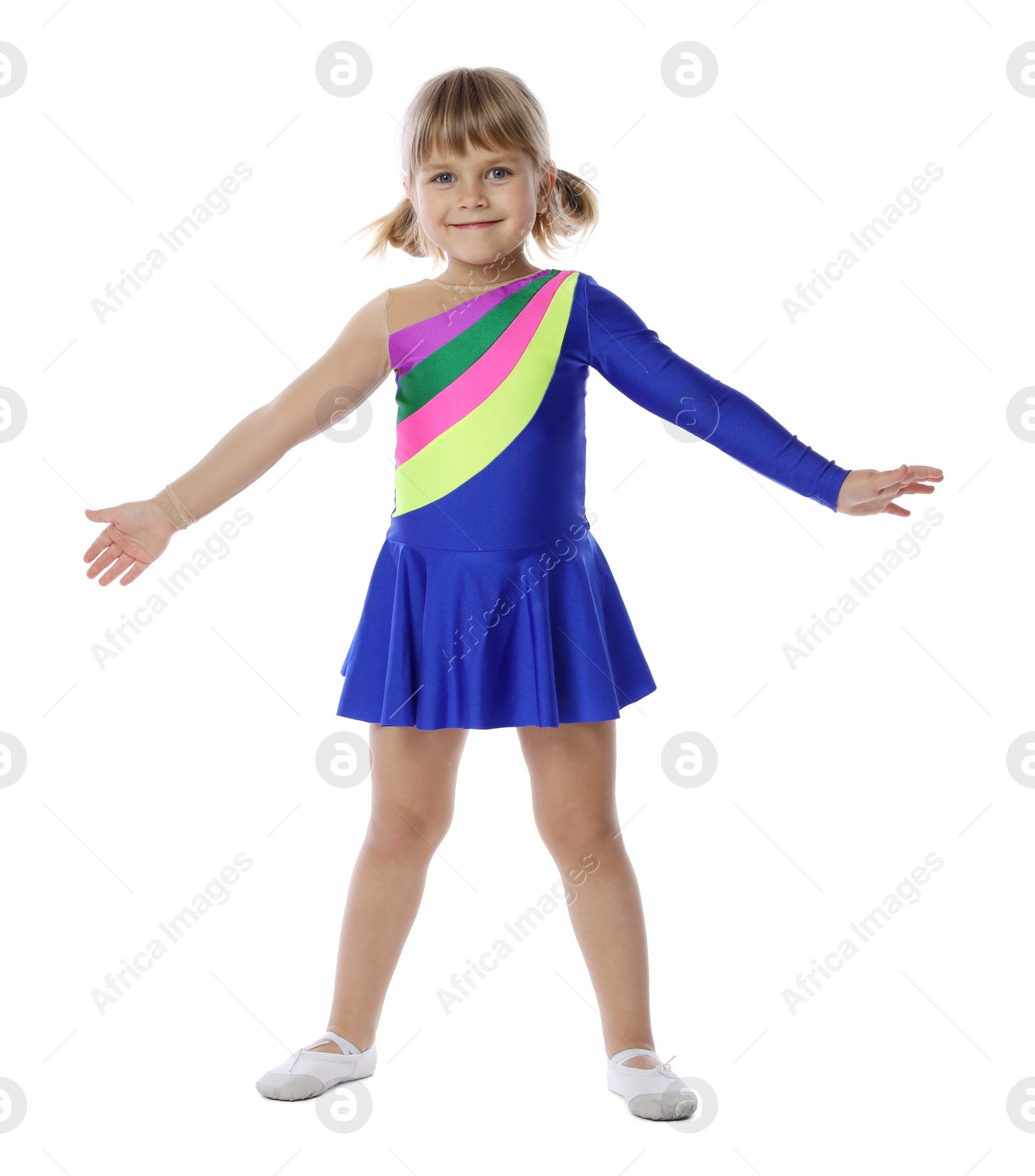 Cute little girl dancing on white background Photo of Cute little girl dancing on white background