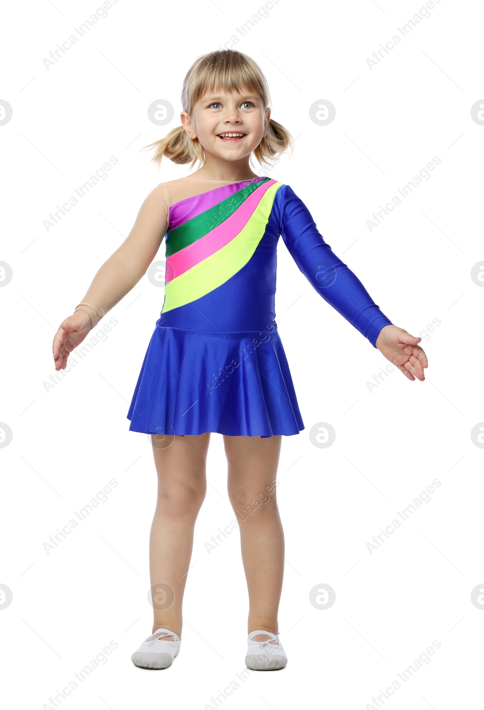 Cute little girl dancing on white background Photo of Cute little girl dancing on white background