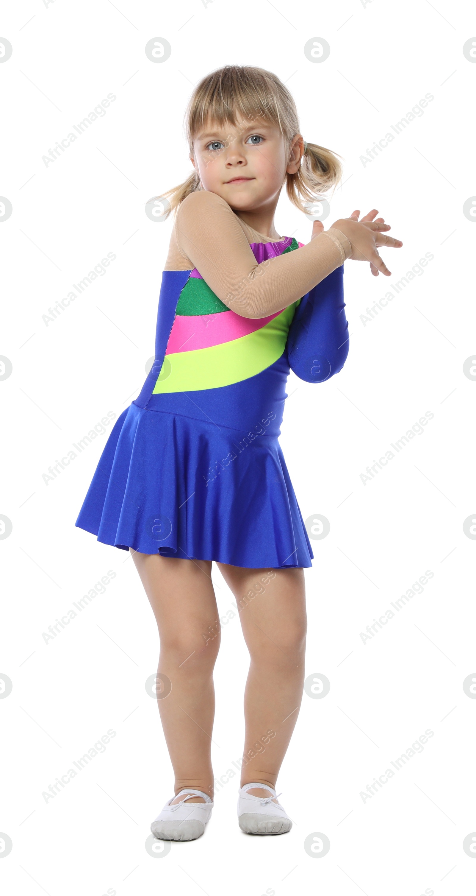 Cute little girl dancing on white background Photo of Cute little girl dancing on white background