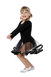 Photo of Cute little girl dancing on white background