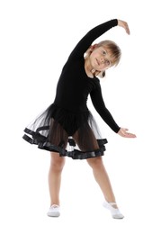 Photo of Cute little girl dancing on white background