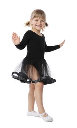 Photo of Cute little girl dancing on white background