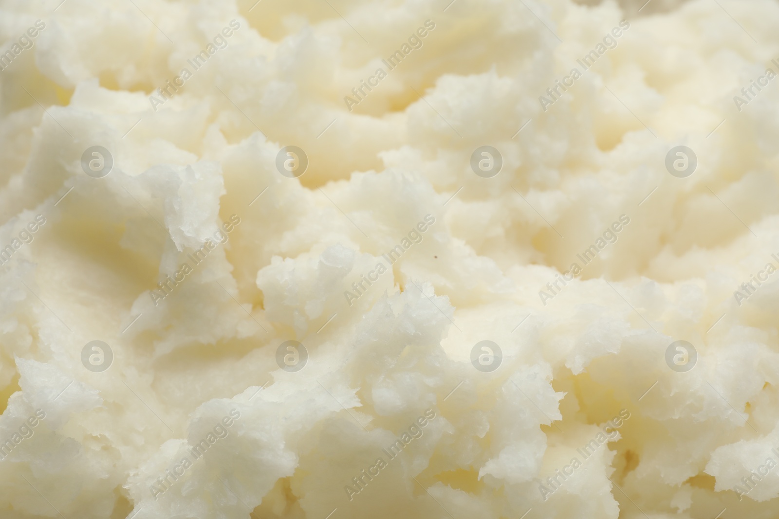 Photo of Texture of organic shea butter as background, closeup