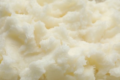 Photo of Texture of organic shea butter as background, closeup