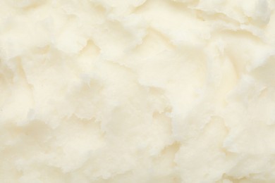 Photo of Texture of organic shea butter as background, top view