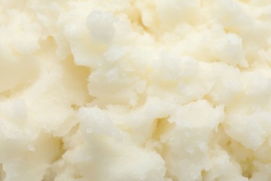 Photo of Texture of organic shea butter as background, top view