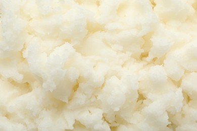 Photo of Texture of organic shea butter as background, top view
