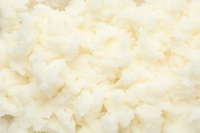 Photo of Texture of organic shea butter as background, top view