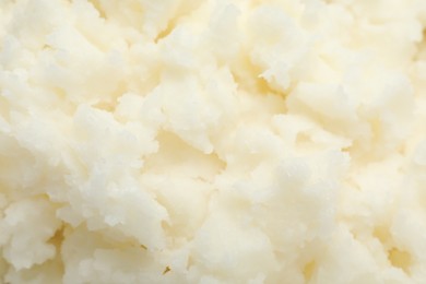 Photo of Texture of organic shea butter as background, top view