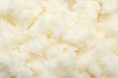 Photo of Texture of organic shea butter as background, top view
