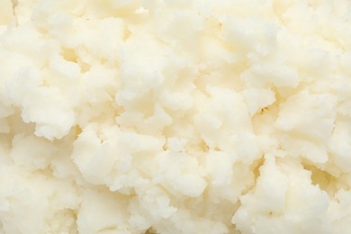 Photo of Texture of organic shea butter as background, top view