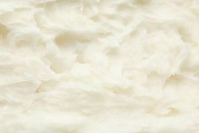 Photo of Texture of organic shea butter as background, top view