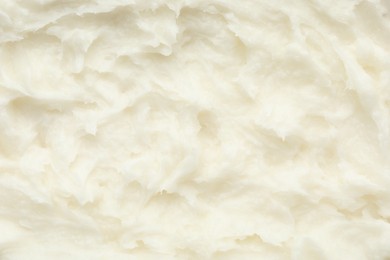 Photo of Texture of organic shea butter as background, top view