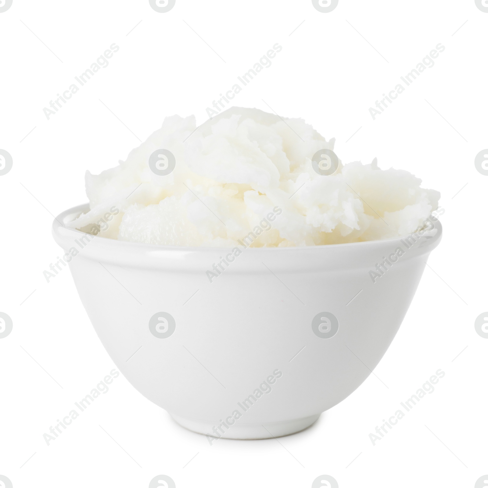 Photo of Shea butter in bowl isolated on white
