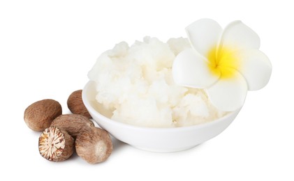 Photo of Shea butter in bowl, flower and nuts isolated on white
