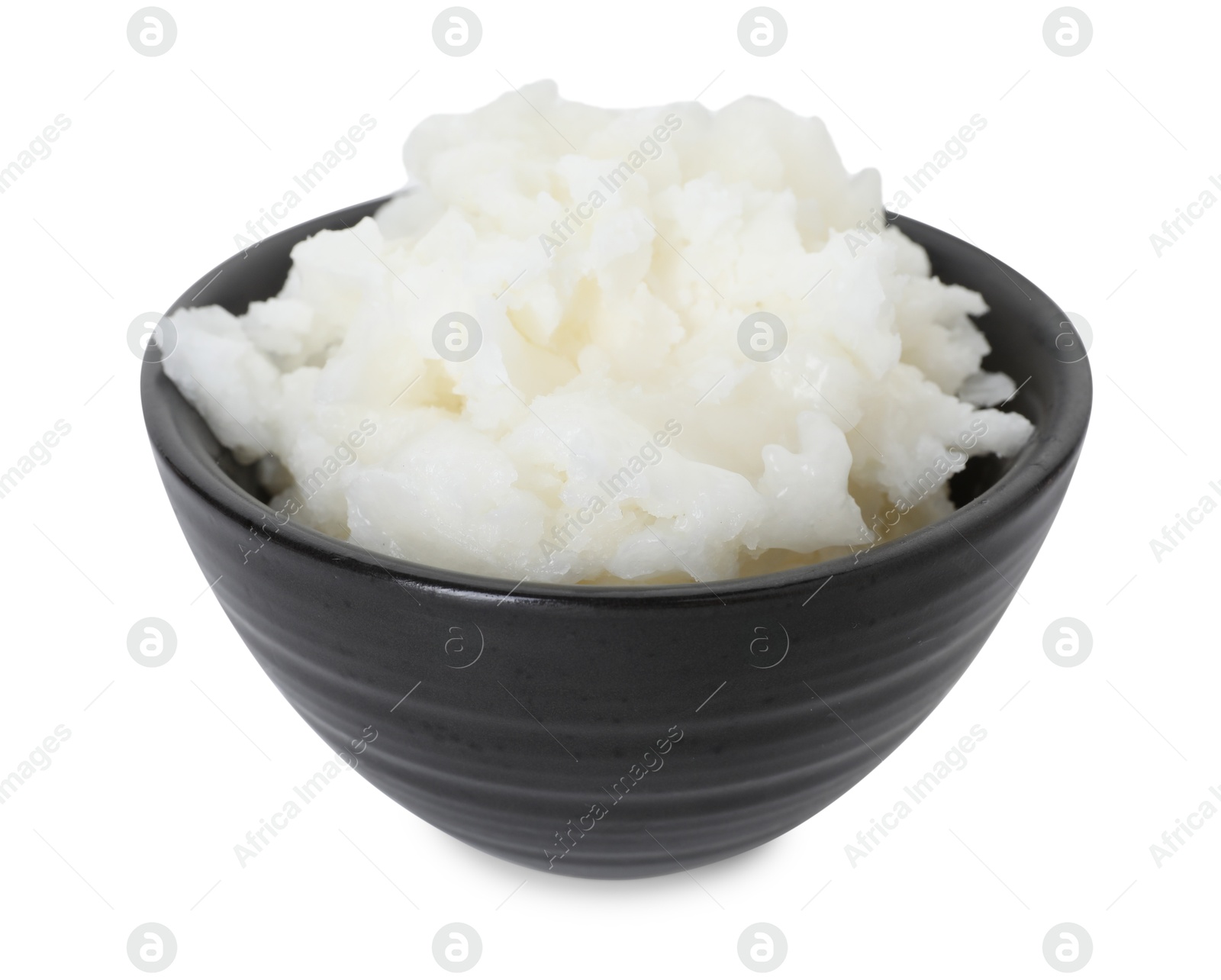 Photo of Shea butter in bowl isolated on white