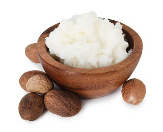 Photo of Shea butter in bowl and nuts isolated on white