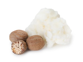 Photo of Pile of shea butter and nuts isolated on white