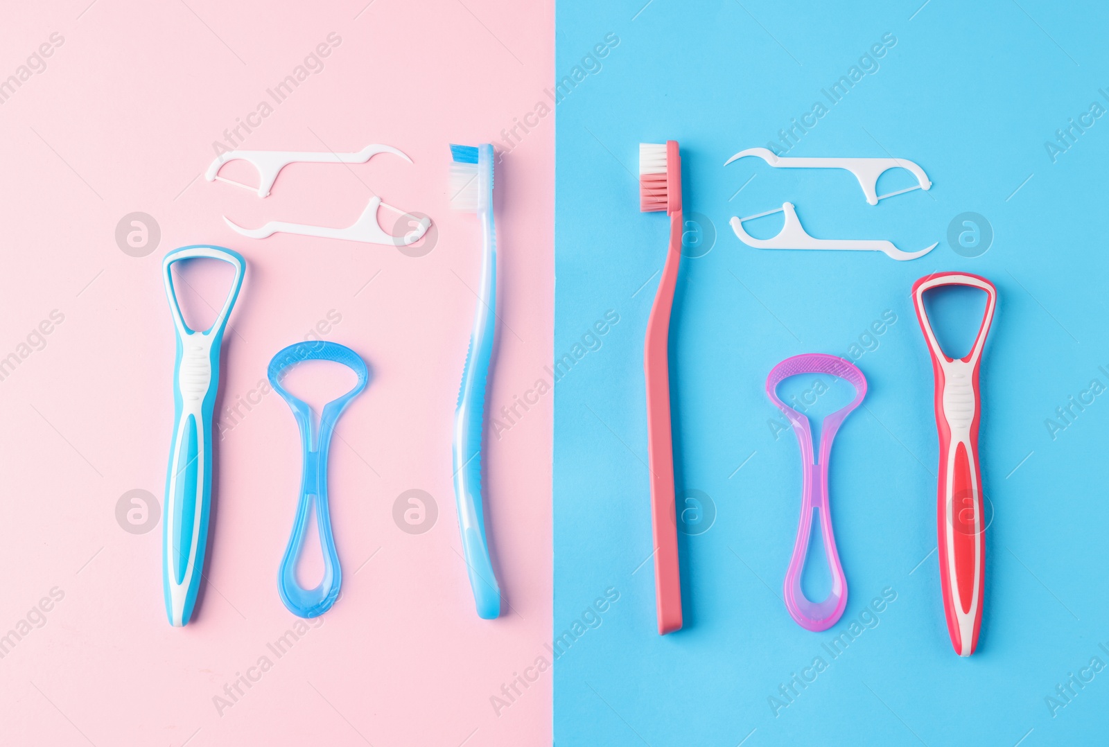 Photo of Different oral care products on color background, flat lay