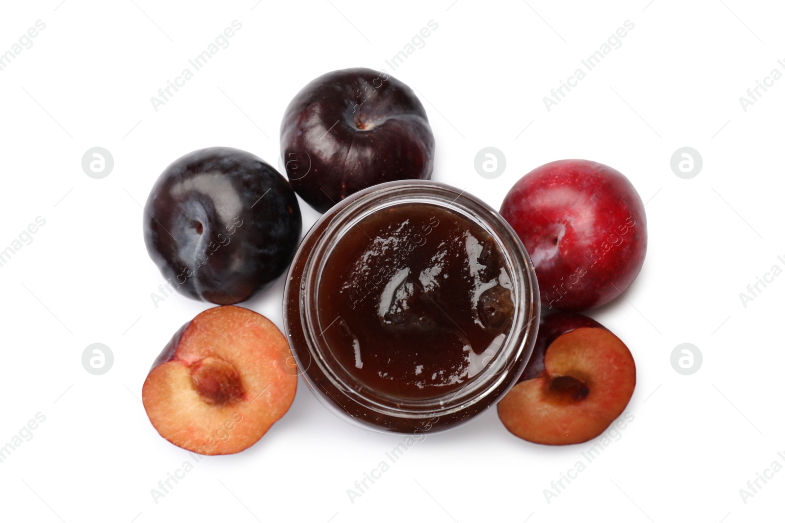 Sweet jam in jar and plums isolated on white, top view Photo of Sweet jam in jar and plums isolated on white, top view