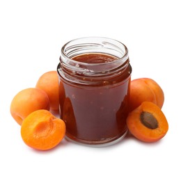 Photo of Sweet jam in jar and apricots isolated on white
