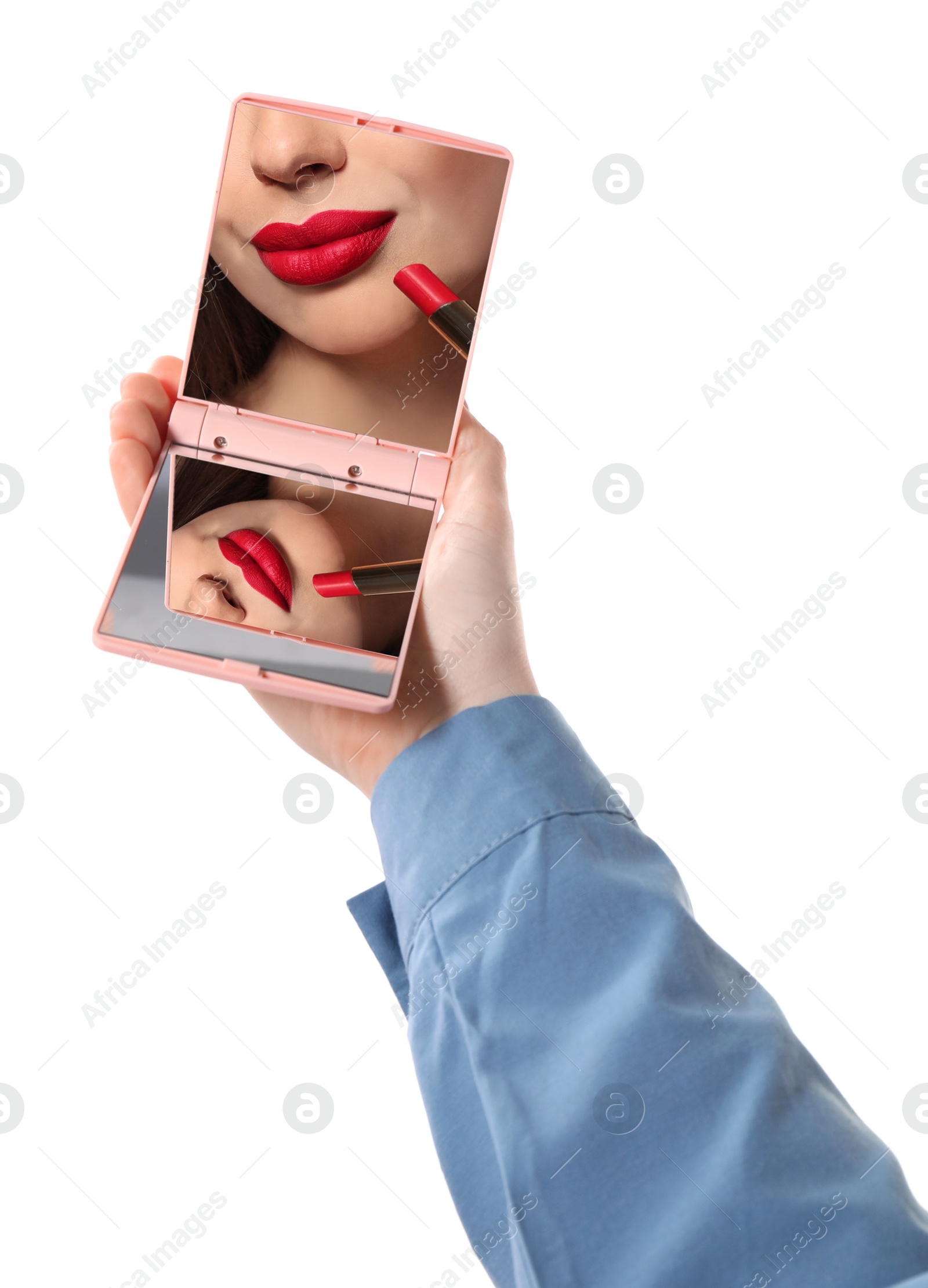Beautiful woman with red lips looking in compact mirror on white background, closeup Image of Beautiful woman with red lips looking in compact mirror on white background, closeup