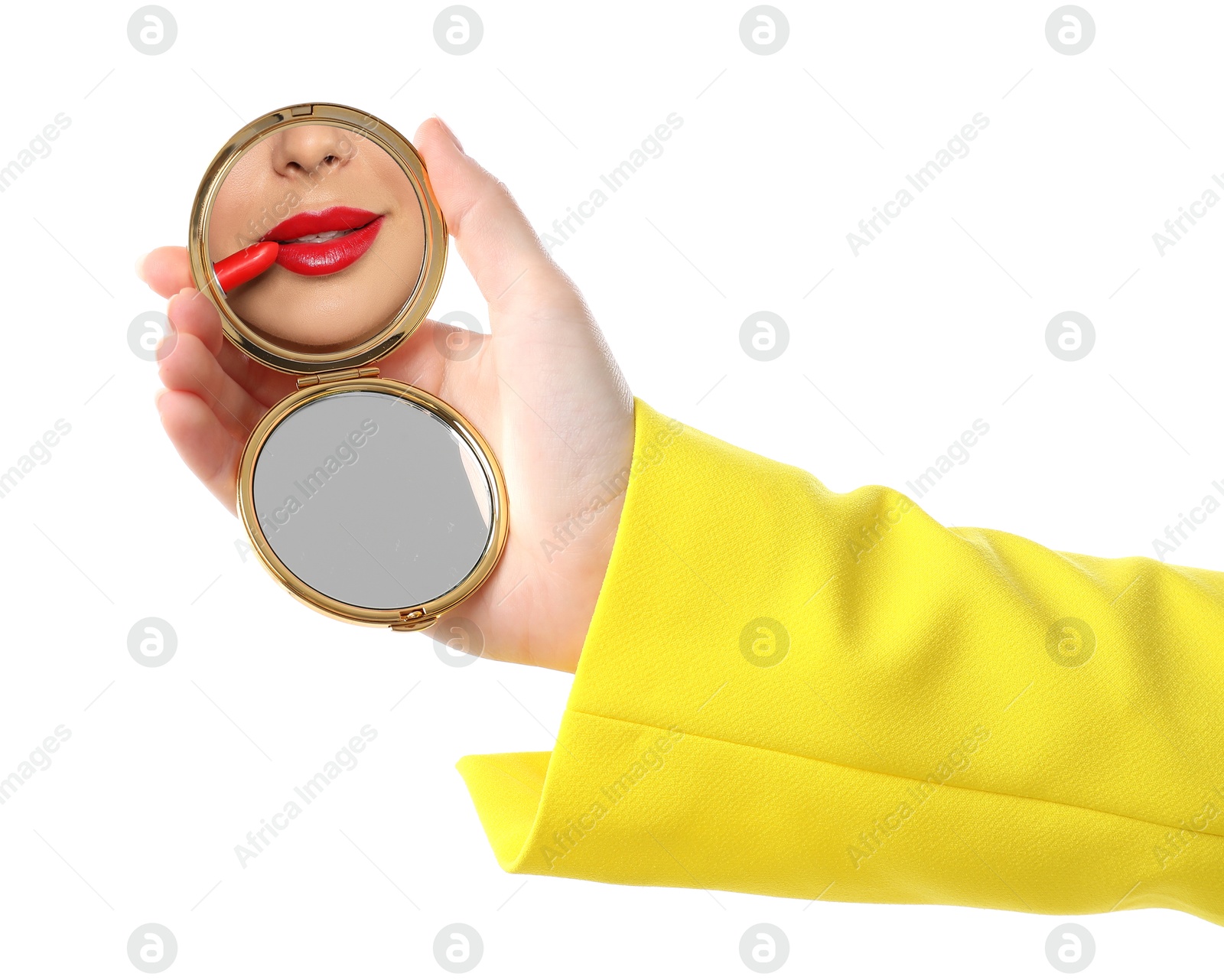 Beautiful woman looking in compact mirror while applying red lipstick on white background, closeup Image of Beautiful woman looking in compact mirror while applying red lipstick on white background, closeup