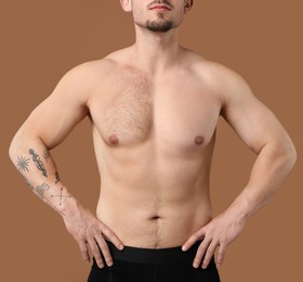 Image of Man showing chest before and after epilation procedure on brown background, closeup