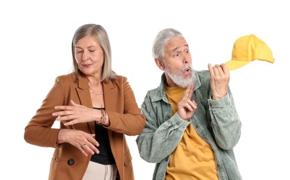 Photo of Senior couple in stylish outfits on white background