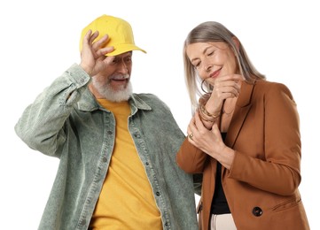 Photo of Senior couple in stylish outfits on white background