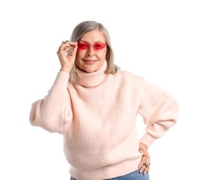 Photo of Senior woman wearing different rings and sunglasses on white background
